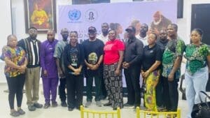 Celebrating the United Nations' Mandela Day with the 'Desert Warrior' 20 Nelsoon Mandela Gardens staff wih Dr Jibunoh